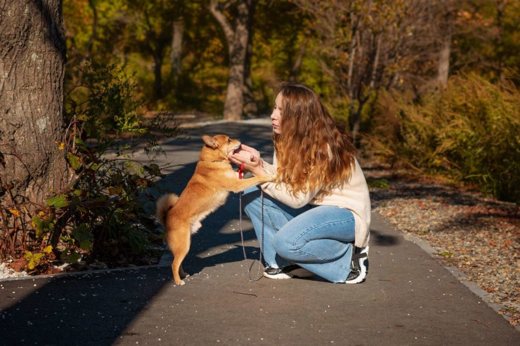 A woman and her dog enjoying Pet Friendly Cabins in Branson, MO.